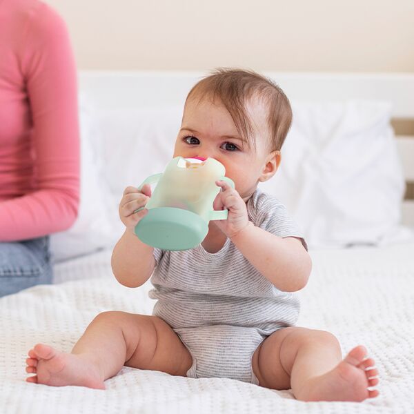 Momcozy Squeeze Proof Holder Babymadmaskine Grøn