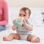 Momcozy Squeeze Proof Holder Babymadmaskine Grøn