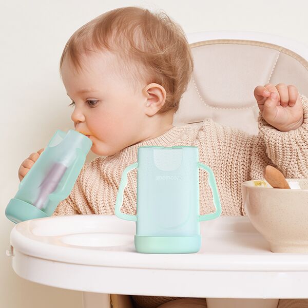 Momcozy Squeeze Proof Holder Babymadmaskine Grøn